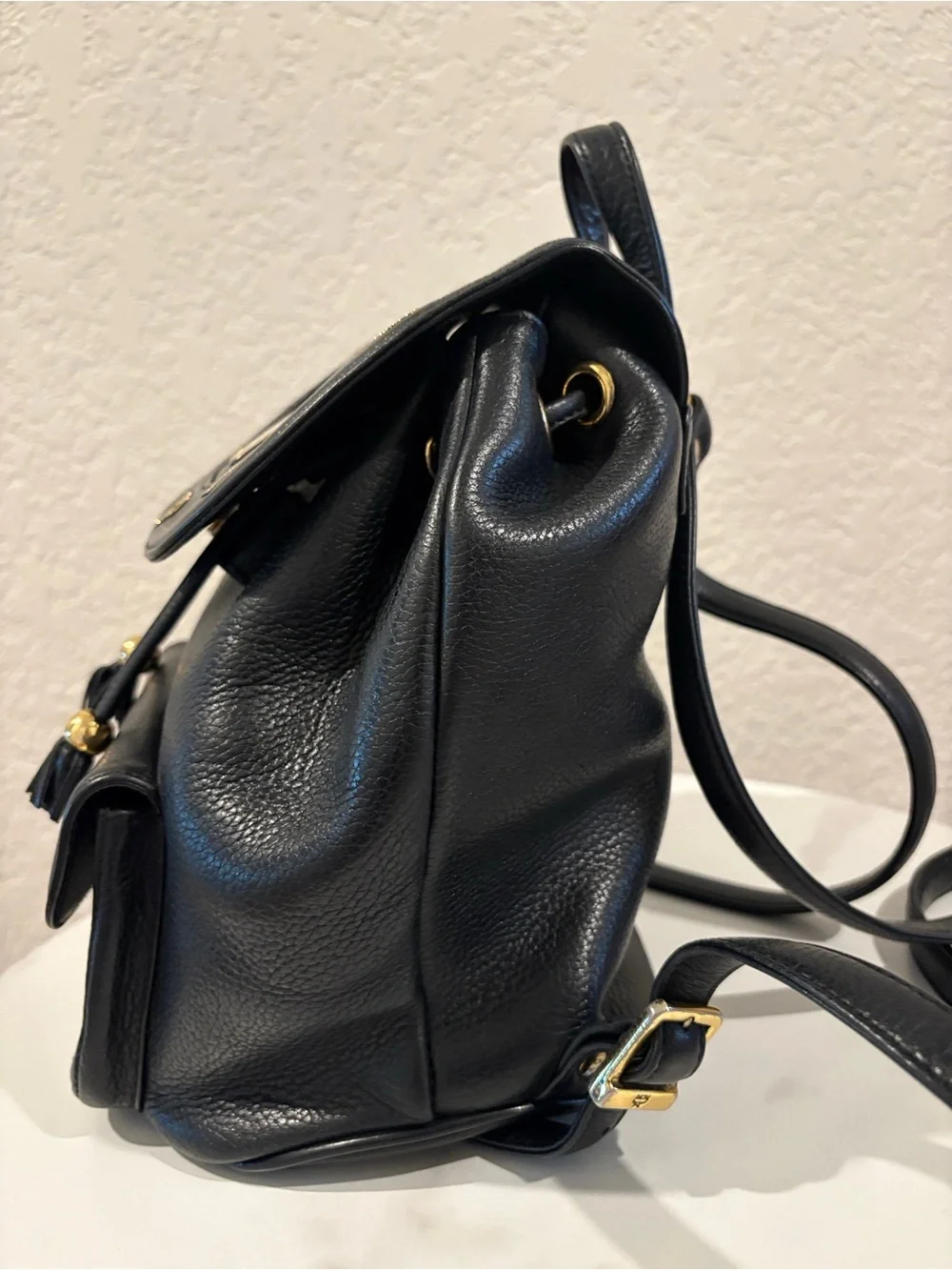 MCM Black Leather Drawstring Backpack with Gold Hardware